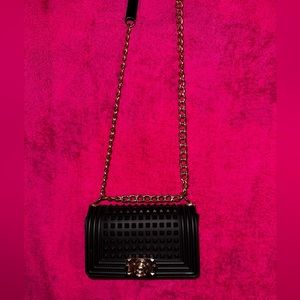 Black & Gold Buckle Purse with Gold Chain .